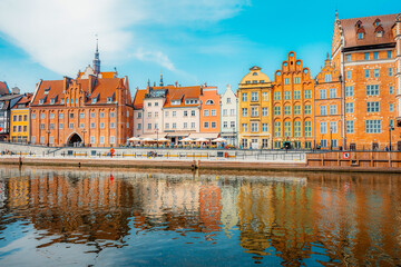 Fototapeta premium Gdansk with Motlawa river in Poland. Old town colourful house with Holy Spirit Gate