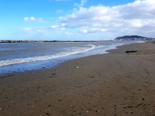 Beautiful seascape with blue sky and white clouds over the sea