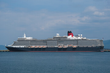 Classic ocean liner cruiseship cruise ship Elizabeth in port of Aomori, Japan with skyscraper...