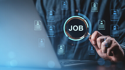 Job search concept with magnifying glass on virtual resumes and laptop screen.