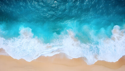 Ocean waves on the beach as a background. Beautiful natural summer vacation holidays background. Aerial top down view of beach and sea with blue water waves