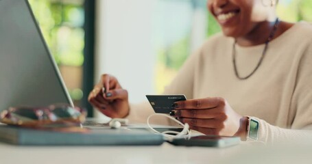 Black woman, credit card and hands with laptop for typing, online shopping and fintech savings in home. Smile, payment and finance for sales, password and code for financial app or ecommerce budget - Powered by Adobe