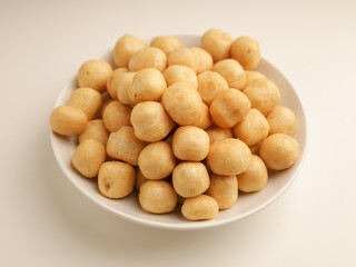 Variety of crackers on white background