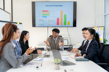 Business Team Meeting with Financial Presentation