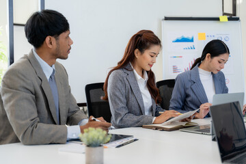 Business Team Collaboration in Meeting Room
