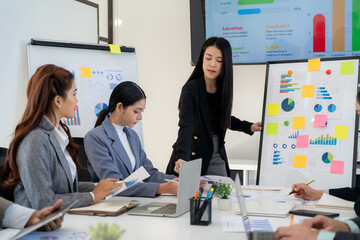 Business Team Meeting with Data Presentation