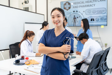 Confident Asian Healthcare Professional in Meeting