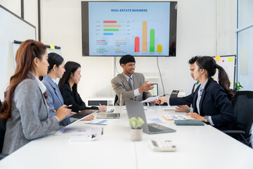 Business Team Meeting with Presentation