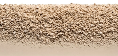 Pile of light brown textured pebbles creates an abstract landscape of varying shapes and forms.