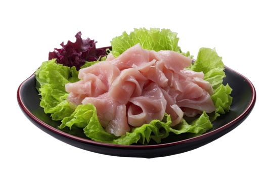 Sliced, light-pink chicken meat on a dark plate with lettuce and red garnish