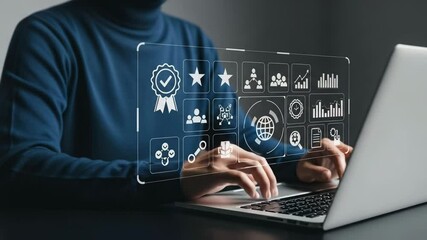 Person using laptop with digital interface displaying business icons and data visualizations shown - Powered by Adobe
