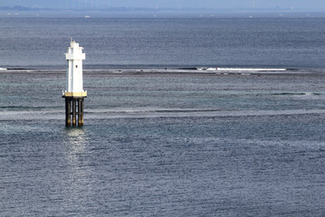 Lighthouse as navigational aid for ships at Senggigi beach, West Nusa Tenggara, Indonesia.