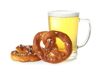 Tasty pretzels and glass of beer isolated on white