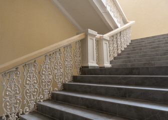 stone staircase in a classical architectural style building
