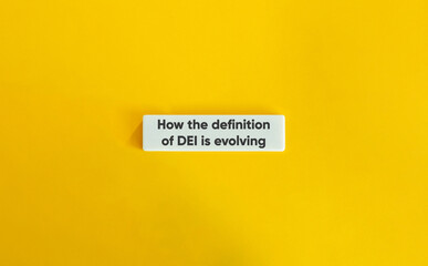 How the Definition of DEI Is Evolving on Letter Tile &ndash; Minimalist Yellow Background Concept