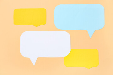 Set of different blank paper speech bubbles on color background