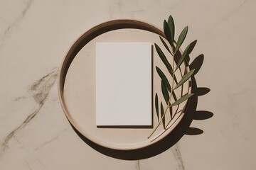Minimalist White Card on Plate with Olive Branch 