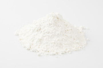 Flour is a powder made by grinding wheat.
