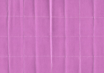 scan of purple paper featuring a tight grid of vertical and horizontal folding marks. The creases...