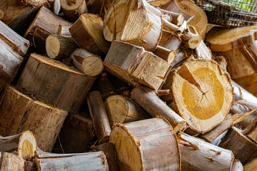 Round logs of thin trees for a fire or fireplace