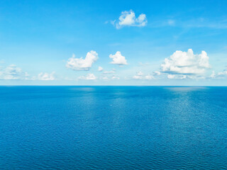 Aerial view beautiful sea and clouds sky at travel Thailand in holiday. High angle view summer background and ocean water, concept Relax, rest, happy freedom or meditation and natural environment 