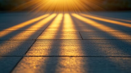 Golden sunbeams on pavement