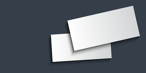 Two brand identity blank, business cards mockup template design on dark grey background. Flat lay, top view.