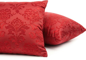 Red damask pattern pillows isolated on white background