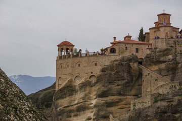 Detail view of landscape of the famous rock formations of Meteora with Varlaam Monastery on top of the rocks, Kalambaka, Thessaly, Greece