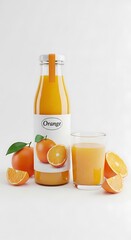 Fresh orange juice bottle with glass and oranges