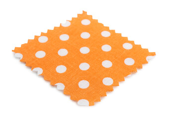 Sample of orange fabric with polka dot isolated on white