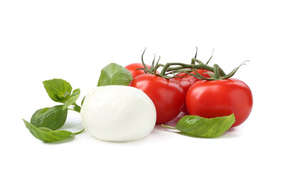 Tasty mozzarella cheese ball, tomatoes and basil on white background