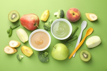 Baby food. Tasty puree in bowls and ingredients on green background, flat lay