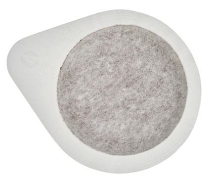 White, round coffee pod or Easy Serving Espresso pod, filled with ground coffee, isolated background