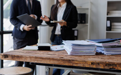 Business Documents,  business people checking and charts to analyze market data, balance sheet,...
