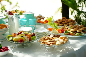 Delicious Buffet Spread with Assorted Foods and Drinks