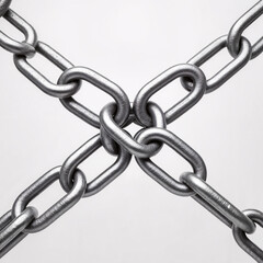Obraz premium Metallic chain links intertwined on white background 