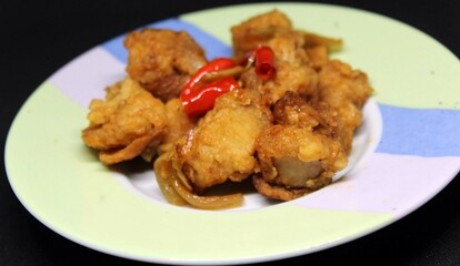 Chicken in sweet and sour sauce with chili.