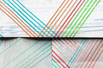 Colorful stripes on gray paper, grunge background