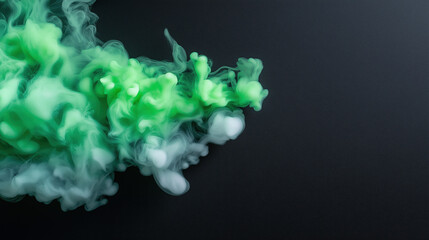 Green smoke swirling on black background