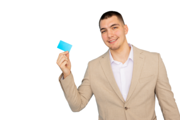 Young businessman smiling and showing credit card on transparent background, ideal for finance and business related concepts