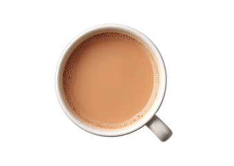 Overhead view of a white mug filled with light brown tea