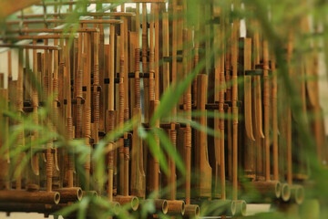 Obraz premium Idiofon or Idiophone (Angklung) is a traditional musical instrument originating from West Jawa, Indonesia made of bamboo