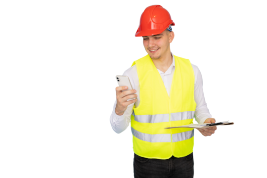 Young engineer wearing safety helmet and vest using smartphone and holding clipboard on transparent background - Powered by Adobe