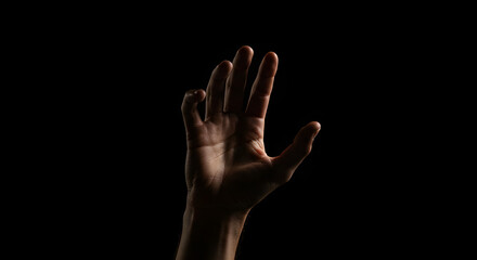  Hand Reaching Out in Low Light