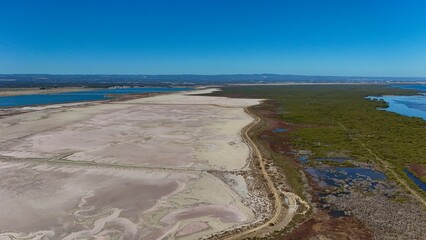 Stunning aerial view of the St Kilda Mangrove Trail and surrounding salt pans in North Adelaide,...