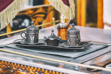Traditional Turkish coffee set in street cafe in Istanbul, Turkey