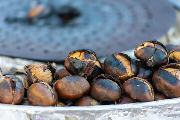 Grilled chestnuts in Turkish street food stall