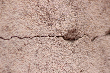 A close-up of a cracked wall
