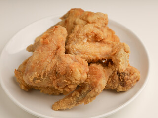 Piled of fried chicken on white background
